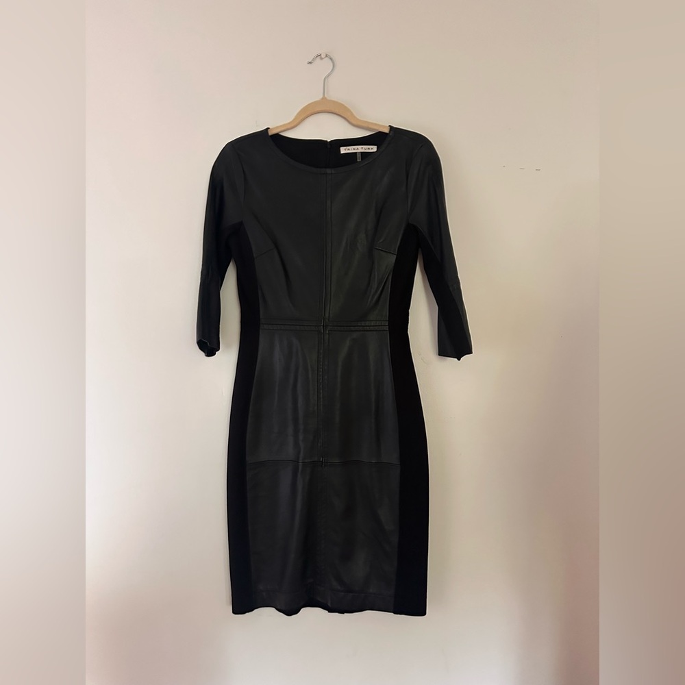 Trina Turk leather LBD. Size:2. Form fitting and flattering LBD.